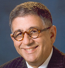 Headshot of Ira Friedman