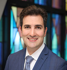 Headshot of Cantor Marcus Feldman