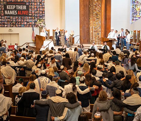 large crowd of people gathered inside a church
